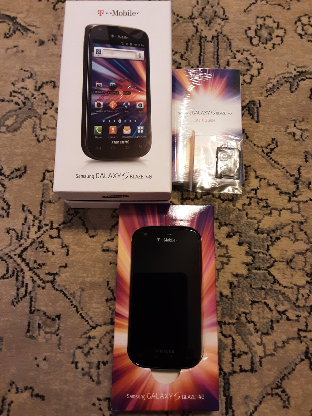 Samsung Smartphone with Black Front and Multi-Color Packaging